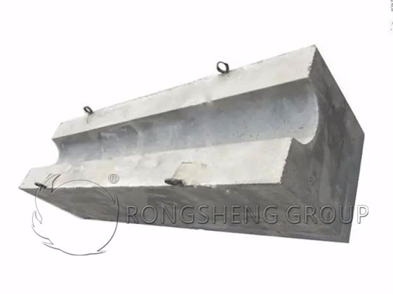 Ultra low cement castable precast shapes for iron trough