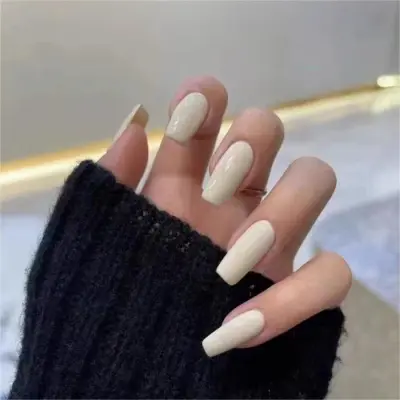 https://shmuker.oss-cn-hangzhou.aliyuncs.com/data/oss/643eba85f5b37d6cf4da3abe/65d16d7ec8f2c97966e38c95/Simple-cream-white-wear-nail-1.jpg