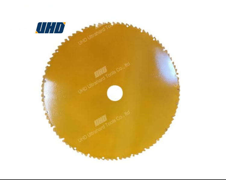 Factory workers operating brazed diamond saw blades in automated cutting machinery